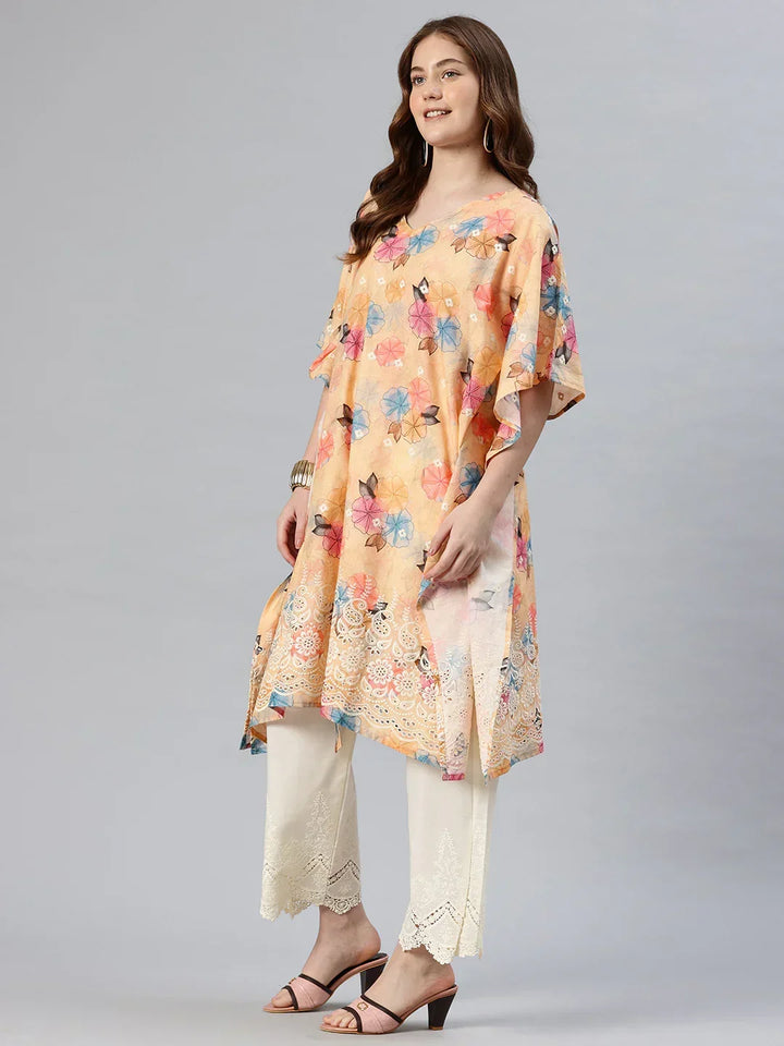 Beige embroidered kaftan kurta side view — relaxed silhouette with cream palazzo | SWI Stylish