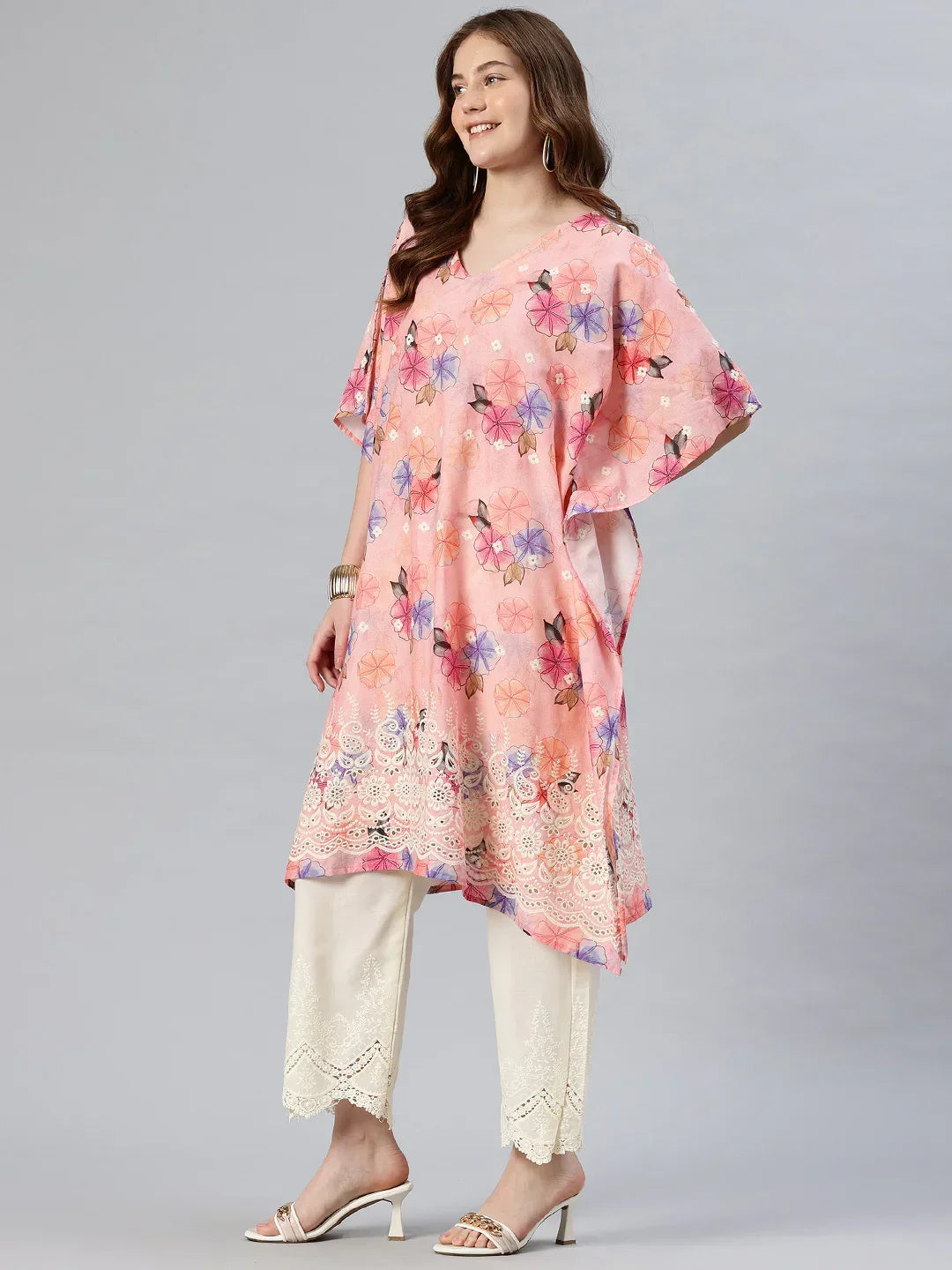 Pink embroidered kaftan kurta side view — relaxed silhouette with cream palazzo | SWI Stylish