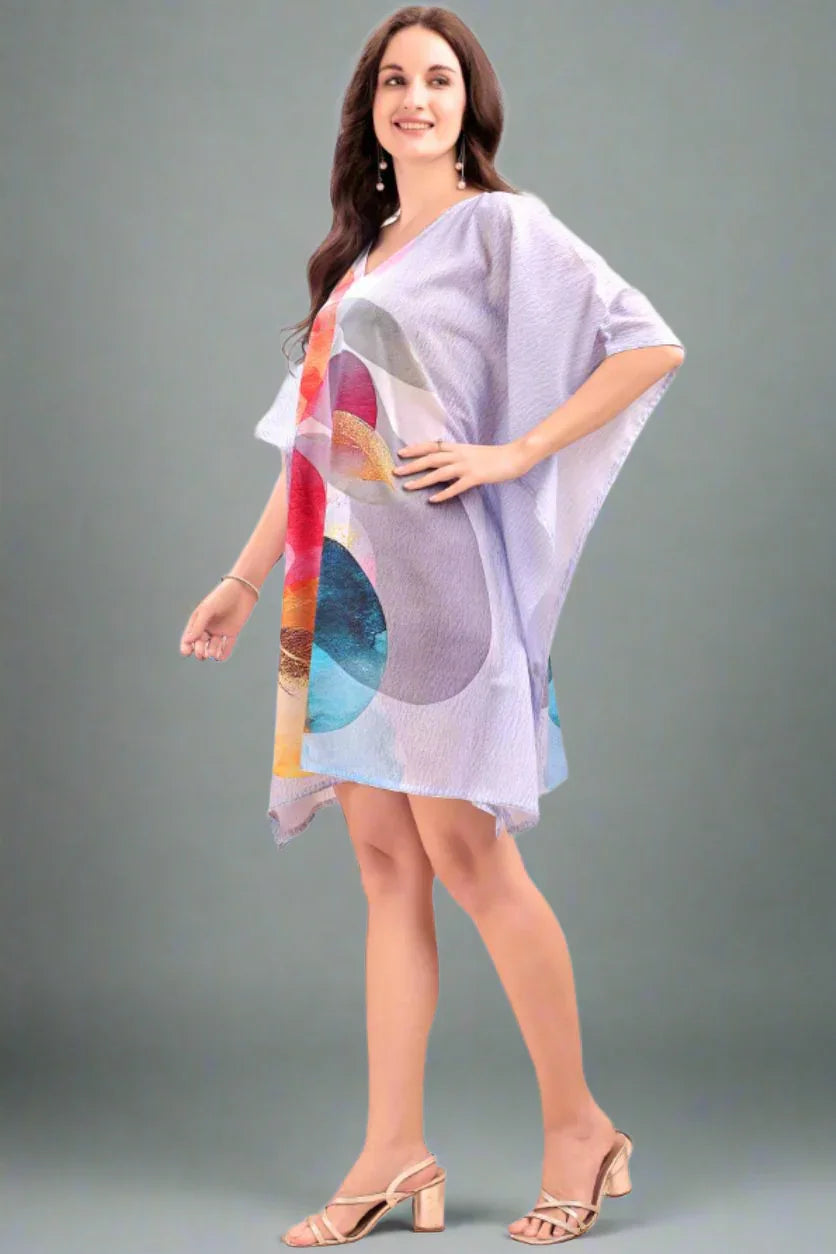 Printed kaftan kurti worn as beach cover-up over swimsuit — vibrant summer vacation style